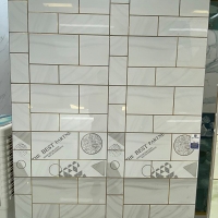 Gạch Trung Quốc 30x60 men kính ghi xám